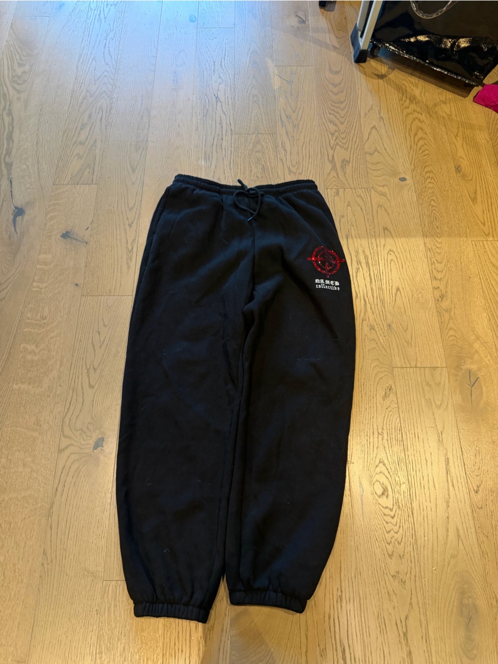Black Fleece Jogger Pants with Red Rhinestone Accent